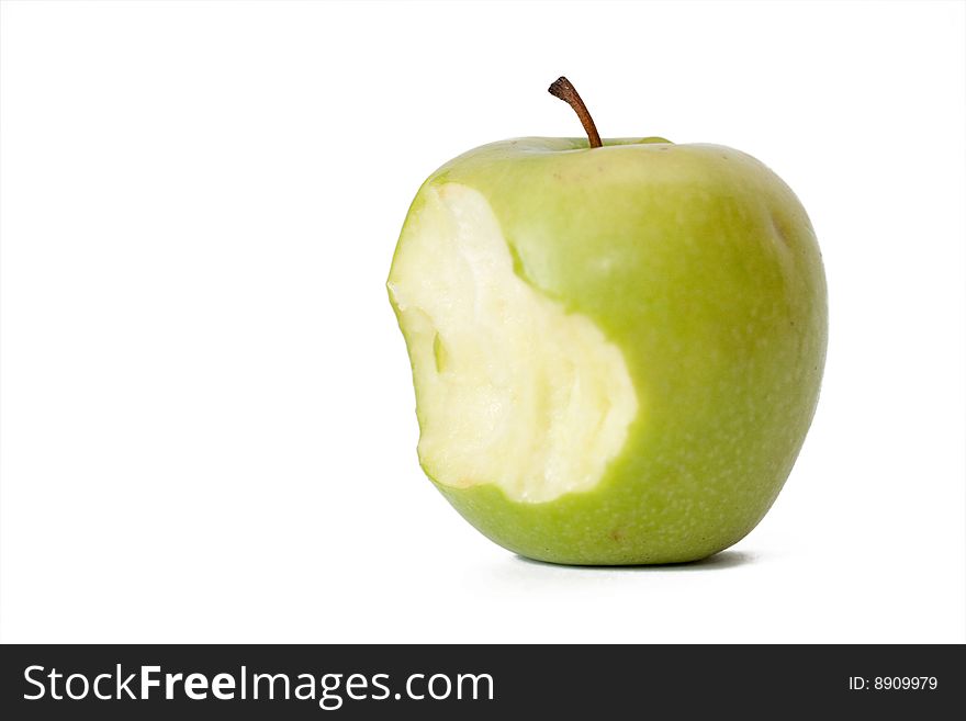 The green taken a bite apple on a white background