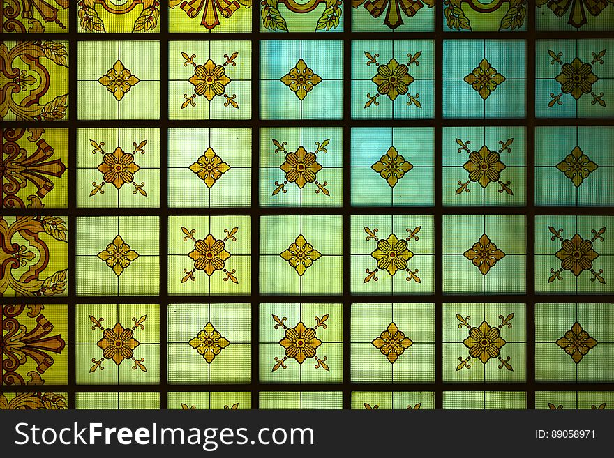 A close up of a ceramic tile pattern.