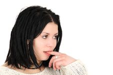 Young Teenage Girl With Finger In Mouth Royalty Free Stock Photo