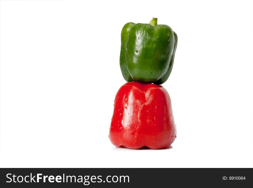 Red and green sweet pepper in a composition