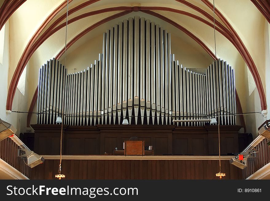 Old pipe organ inside of church