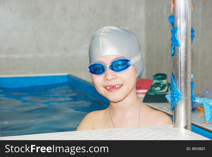 Smiling little girl in pool