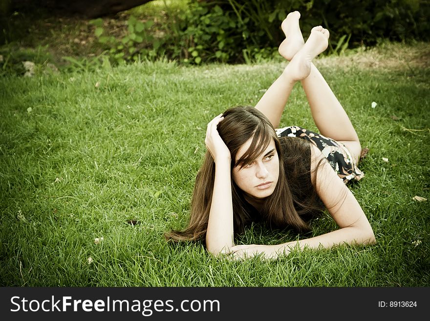 Young Woman On Grass