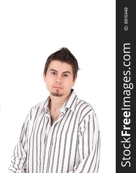 Portrait of young man in striped shirt, studio shot