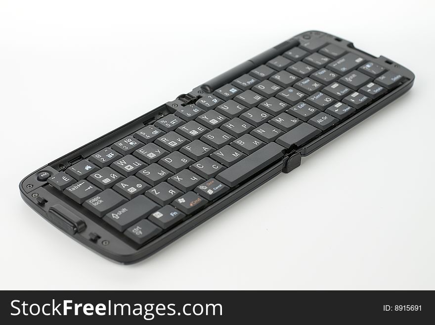 Compact black keyboard for mobile telephone