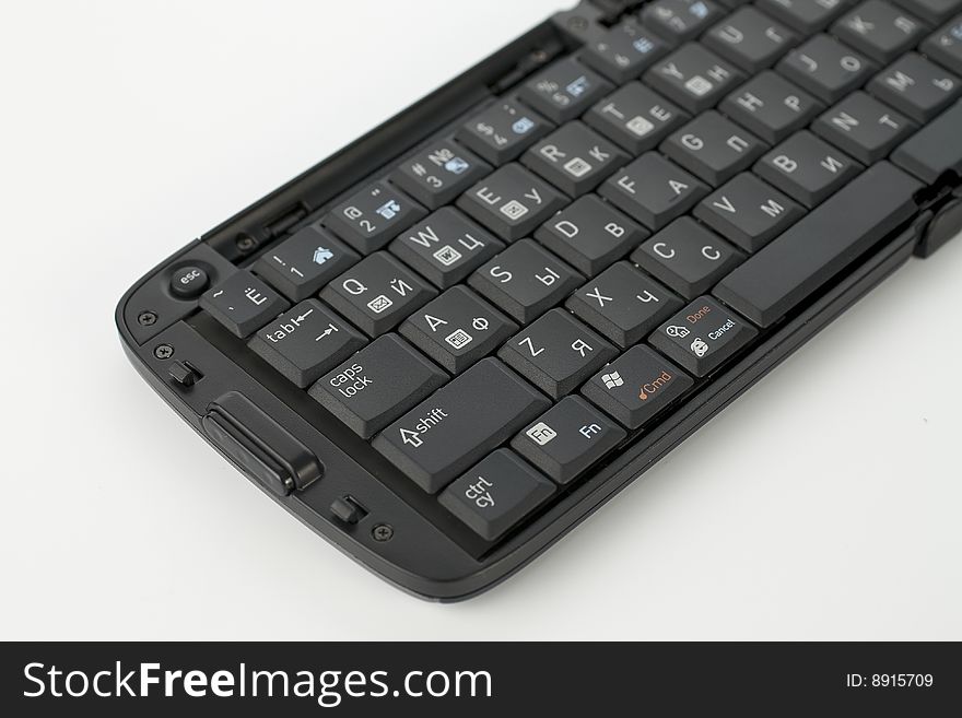 Compact black keyboard for mobile telephone
