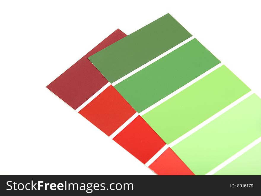 A red and green paint sample on white background. A red and green paint sample on white background.