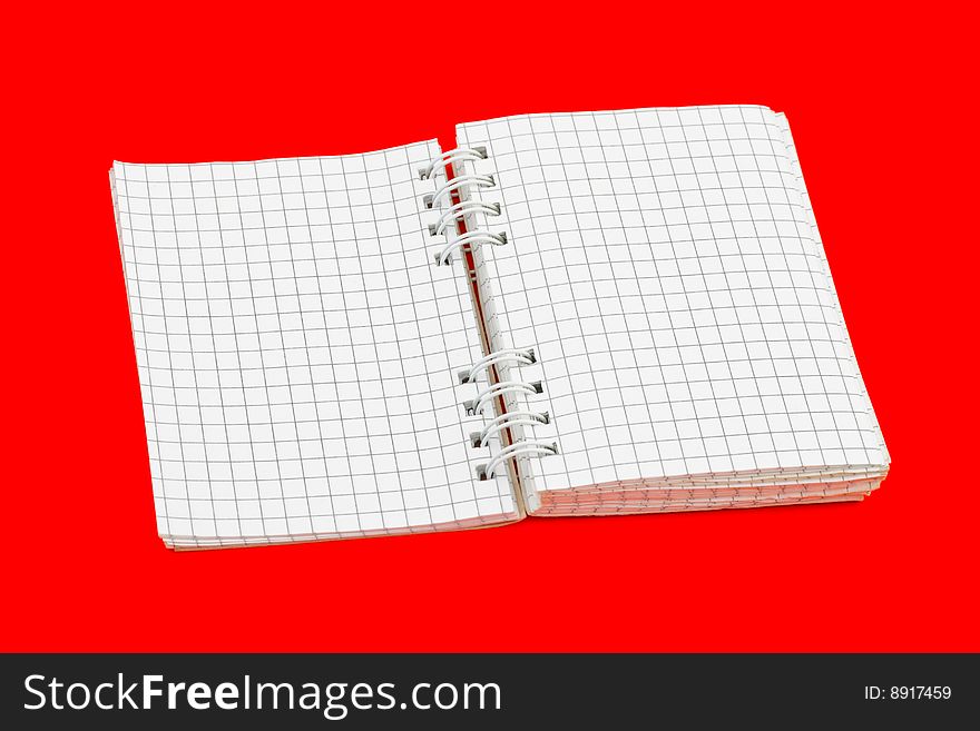 Note pad isolated on red background