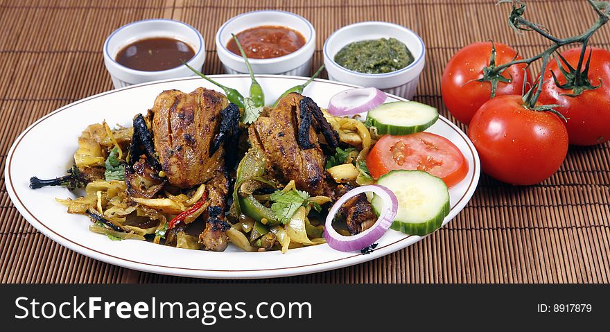 Tandoori quail set in platter