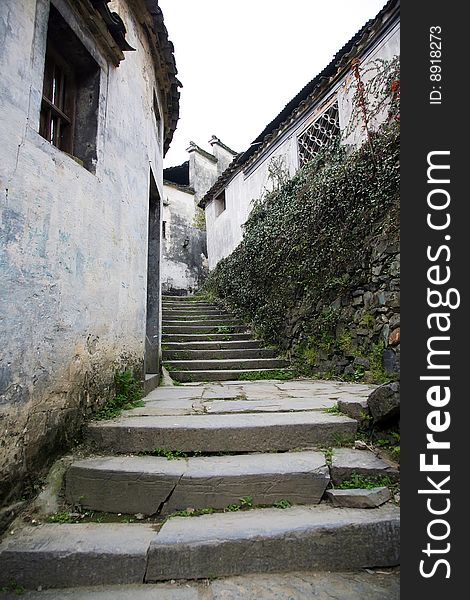 Detail of a narrow village street, at anhui china. Detail of a narrow village street, at anhui china.