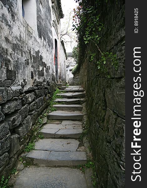 Detail of a narrow village street, at anhui china. Detail of a narrow village street, at anhui china.