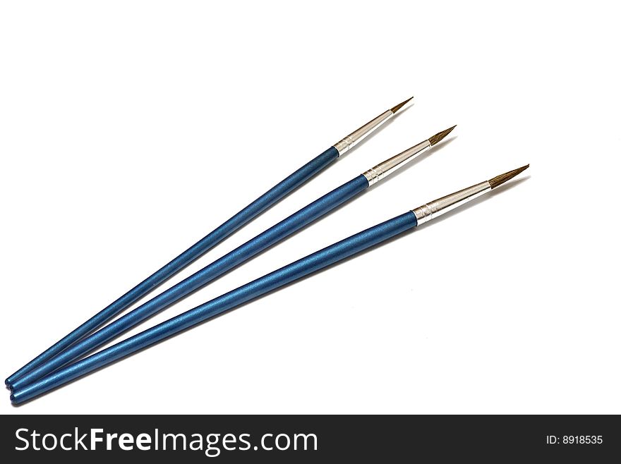 Three blue brushes for drawing. Three blue brushes for drawing