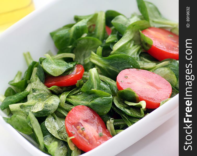 A fresh salad of field-salad with tomatoes