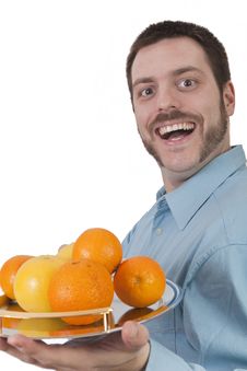 Young Man Serving Fruit With Big Smile Stock Photos Young Man Serving Fruit With Big Smile Stock Photos