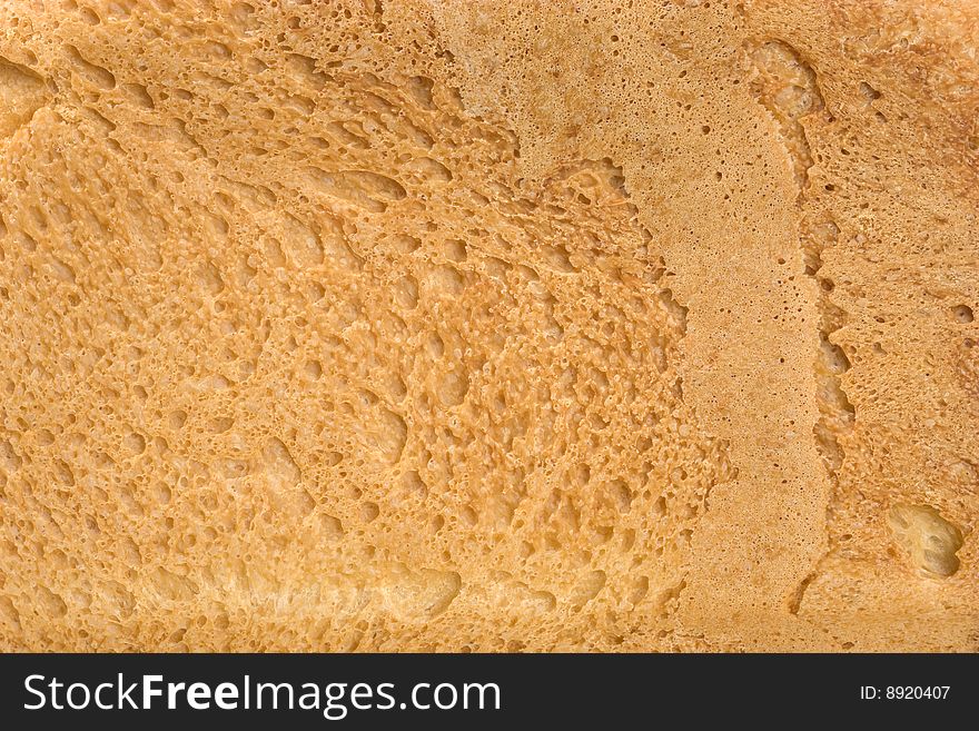 Background of fresh bread. The Piece of bread. Background of fresh bread. The Piece of bread.