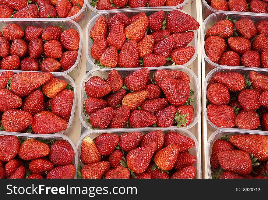 Strawberries in the bowl, offered on the market