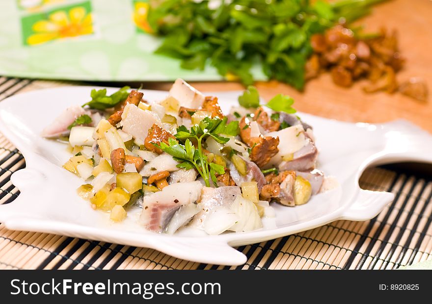 Herring fresh salad with chanterelles. Herring fresh salad with chanterelles