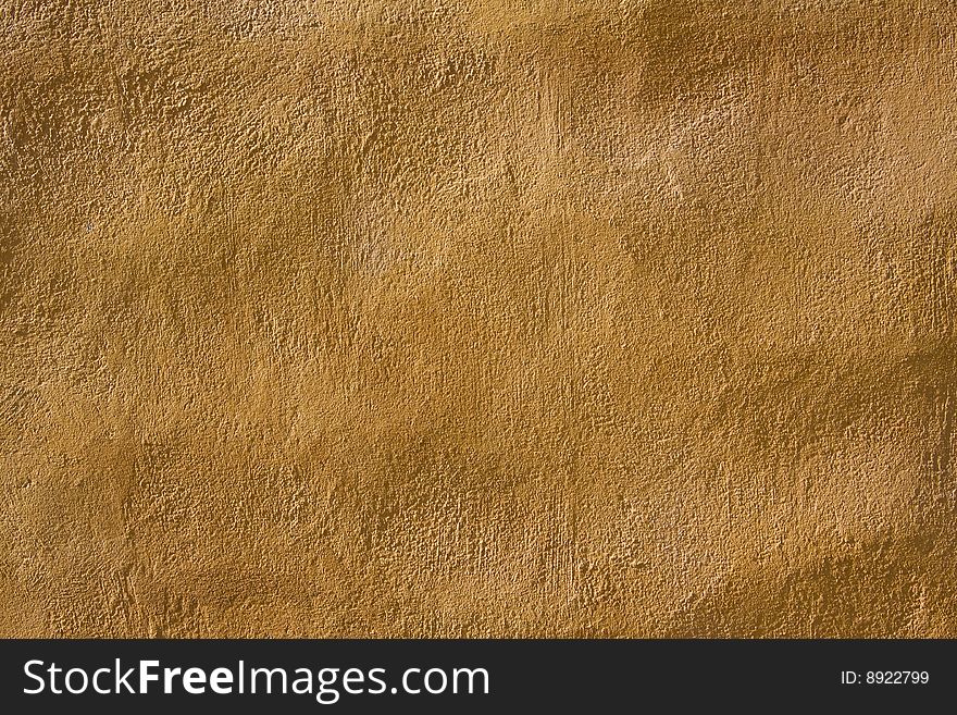 Yellow cement wall texture background. Yellow cement wall texture background