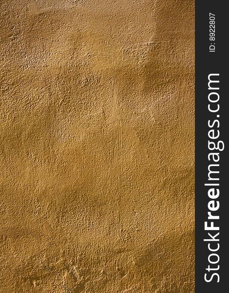 Yellow cement wall texture background. Yellow cement wall texture background