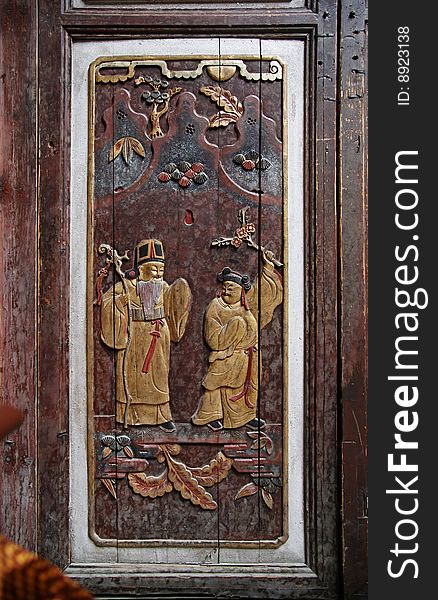 Ancient carving on a wooden door of an old building in anhui,china. Ancient carving on a wooden door of an old building in anhui,china.