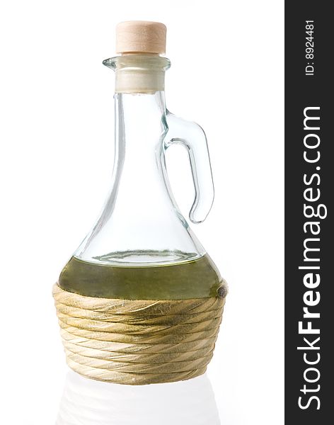 Jug of oil isolated on a white background