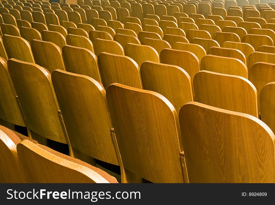 An empty old fashioned movie theater or conference hall. An empty old fashioned movie theater or conference hall.