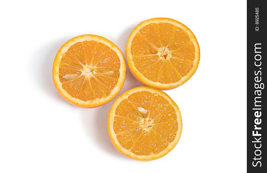 Three slices of citrus orange fruits isolated on white background. Three slices of citrus orange fruits isolated on white background