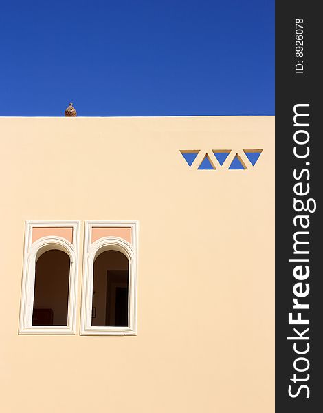 Wall of arabian house with windows