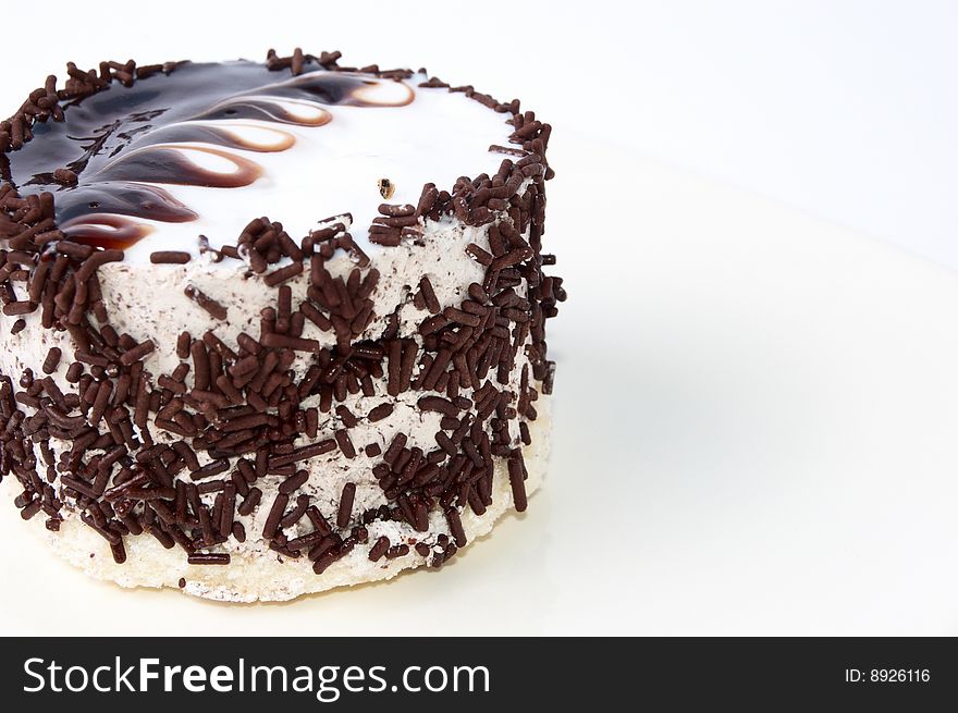 The beauty chocolatecake isolated on whine background. The beauty chocolatecake isolated on whine background