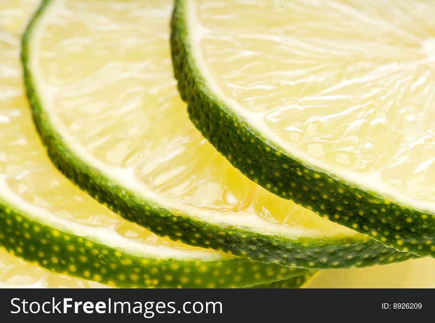 A Macro Of A Stack Of Fresh Cut Lime Slices.