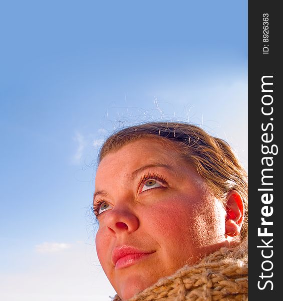 Beauty - Close up Portrait of a woman looking up at copyspace