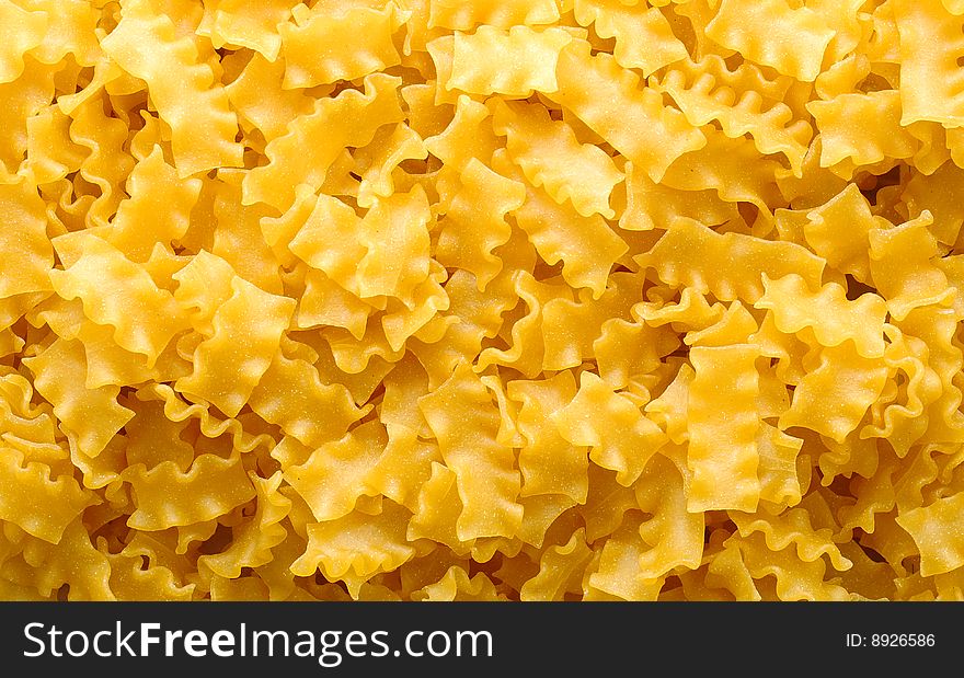 Fresh, yellow pasta background texture