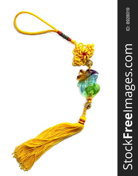 A chinese traditional knot with golden tassel and chinese letterhappy which made of coloured glaze. A chinese traditional knot with golden tassel and chinese letterhappy which made of coloured glaze.
