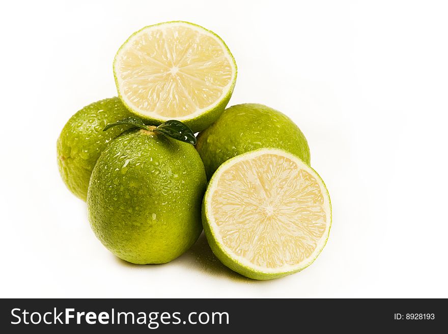 Fresh green lemons full of vitamins