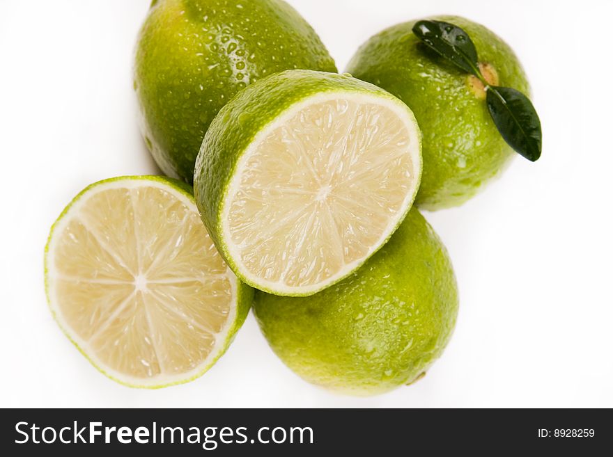 Fresh green lemons full of vitamins