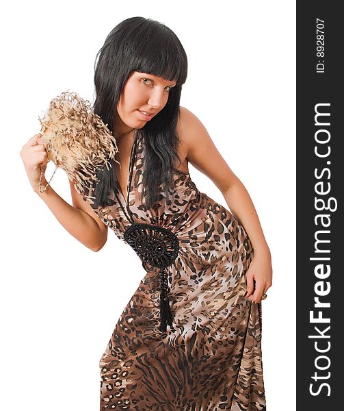 Young female with fur fan in long dress isolated over white with clipping path