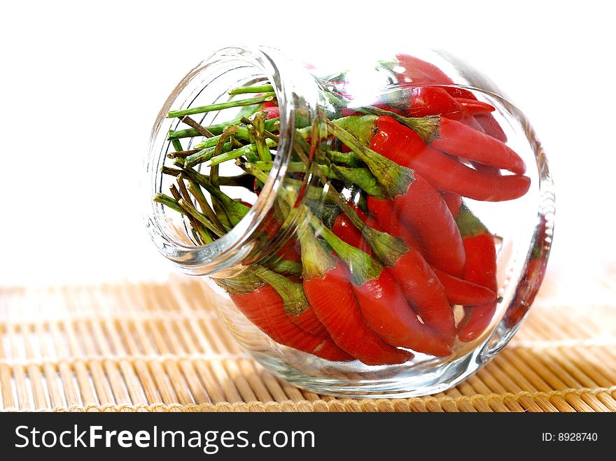 Close up capture red spicy chili on white background. Close up capture red spicy chili on white background