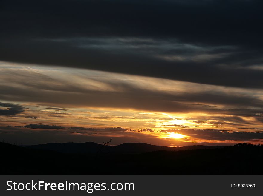 Sunset above the Prairie seen from the Black Hills in South Dakota