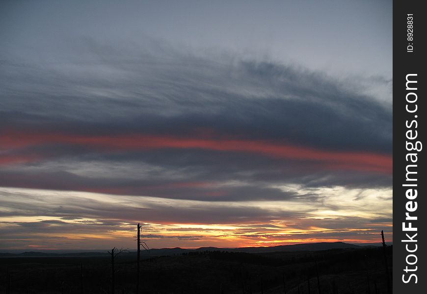 Stripe in clouds during Sunset