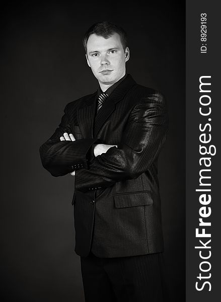 Young Man On A Black Background