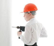 Teenager Drill The Wall Royalty Free Stock Photos