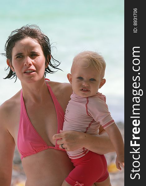 Mother and baby at beach