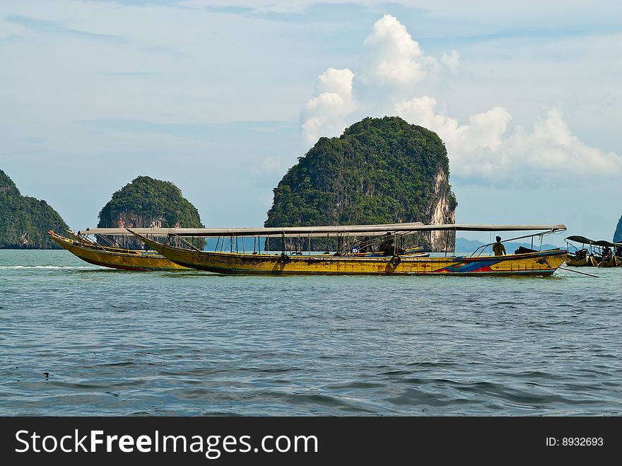 Traditional Thai Tourist Wooden Boats At The Sea