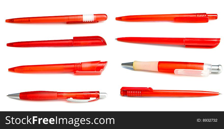 Collection of red pens on white ground