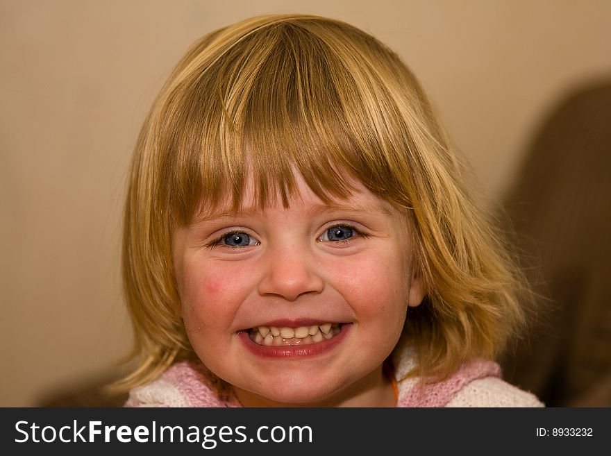 Close-up portrait of happy smiling baby