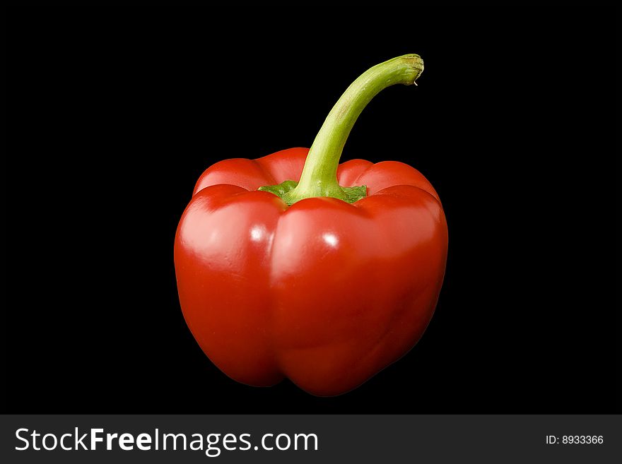 Delicious fresh red pepper croped on black background