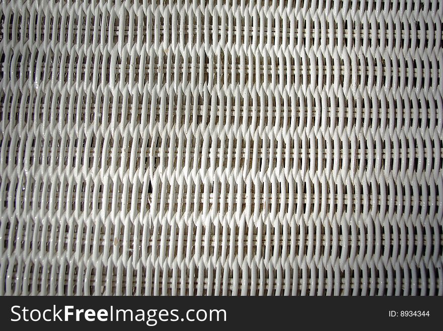 Close up of woven wicker to make white wicker textured background