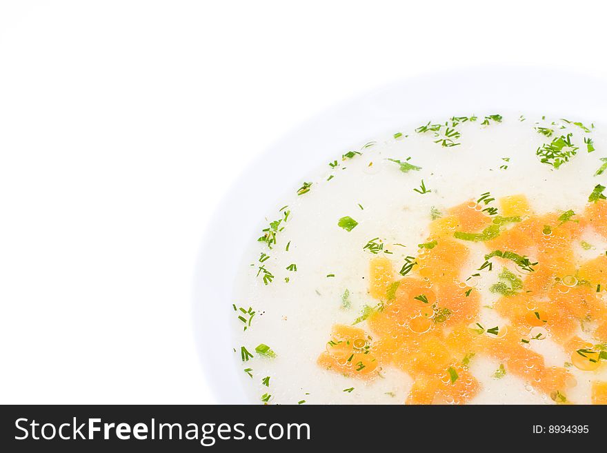 Clear Chicken Broth close-up isolated over white background