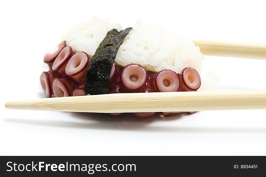 Delicatessen octopus meat isolated on the white background