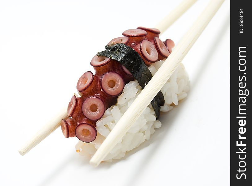 Delicatessen octopus meat isolated on the white background